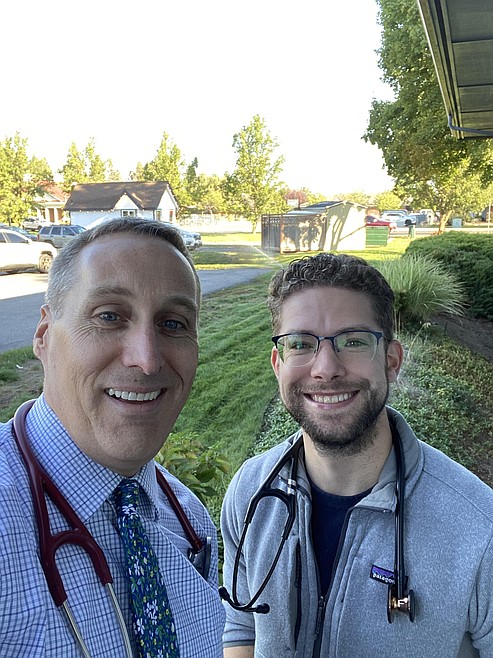 Dr. Geoff Emry and Dr. Mark Walsworth after completing their walk to work