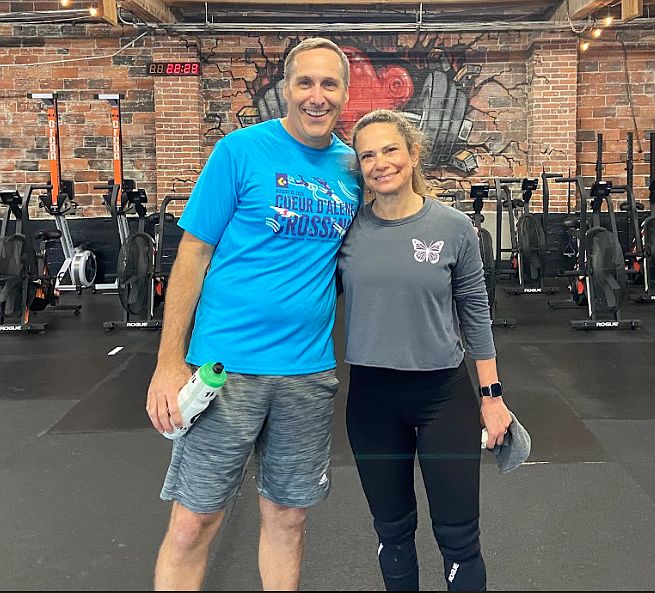 Dr Emry and Caline Lybarger posing after class