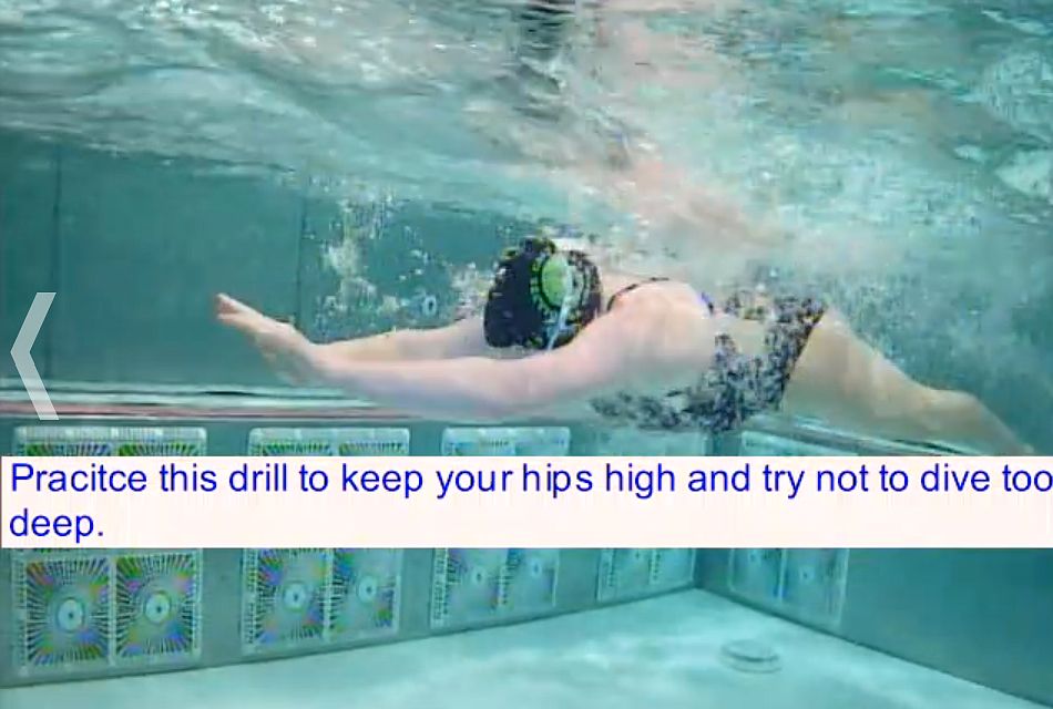 Nina Emry practices breaststroke in the SwimLab tank.