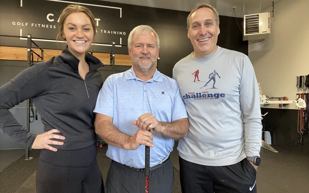 Cam Abey, Dr. Tim Burns and Dr. Geoff Emry with golf clubs